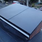 伊勢原市田中にて煙突板金が剥がれたため新規板金取り付け工事を実施