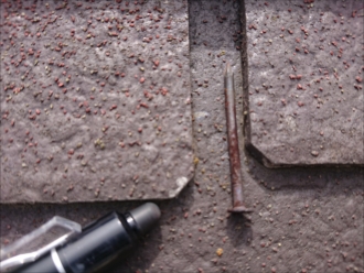 屋根に落ちていた釘